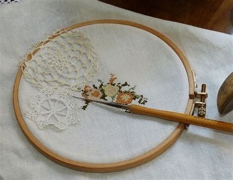 stretching fabric over a metal hoop|embroidery frame with hoop.